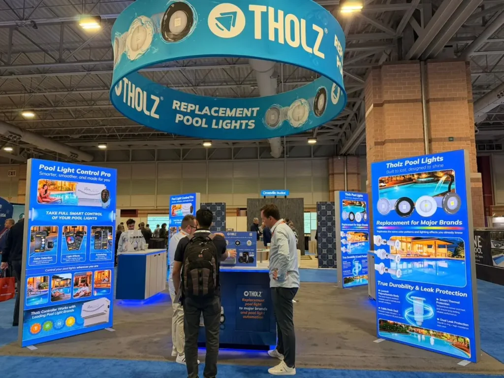 Tholz Global exhibition booth showcasing replacement pool lights and pool light control solutions at an international trade show.
